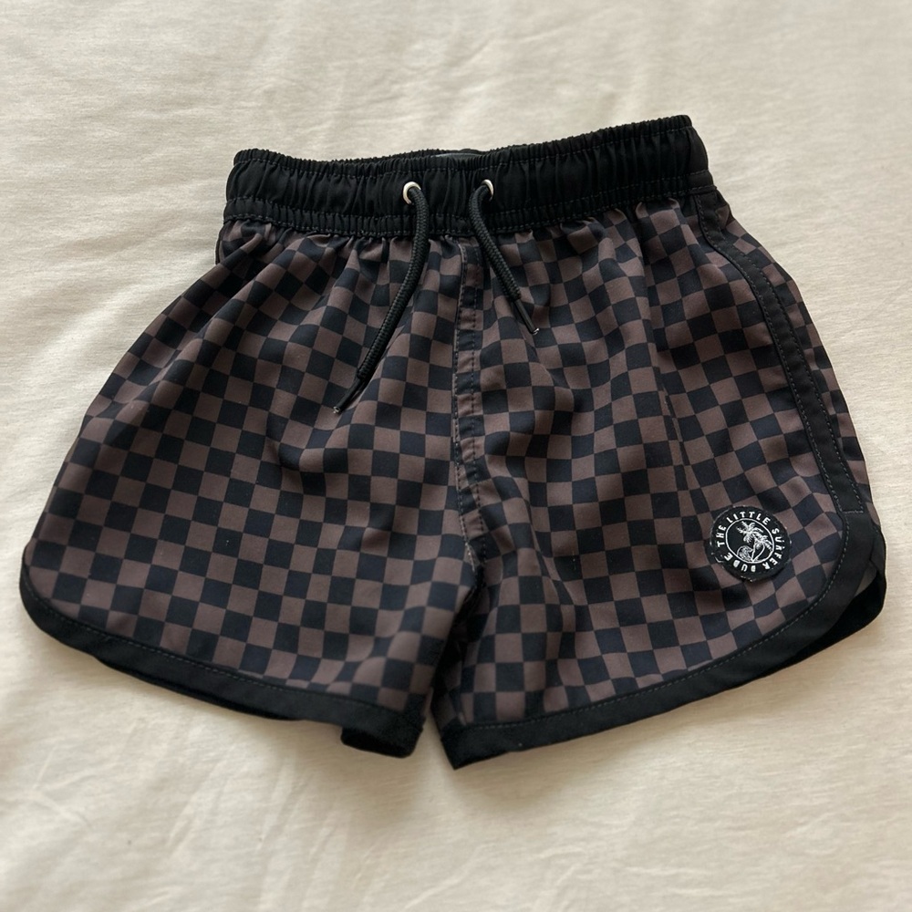 Little Surfer Dude Swim Trunks
Size Toddler 2/3
Black and Grey